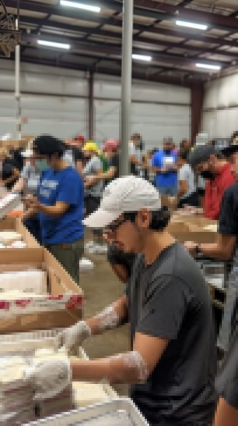 Volunteer Packing Food